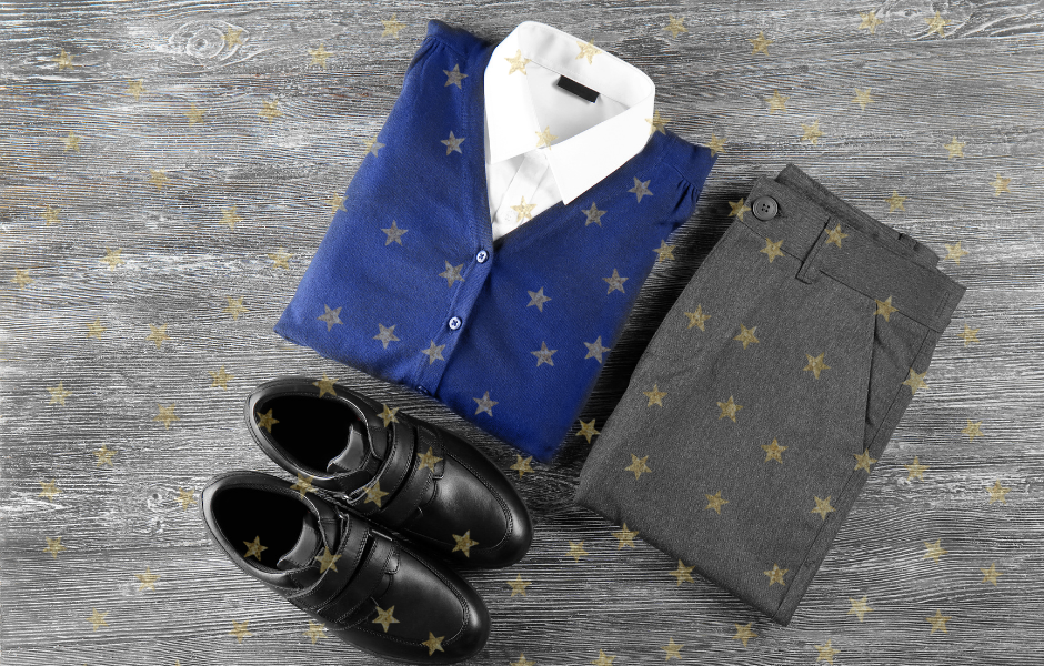 A folded school uniform - Why do students wear school uniforms?