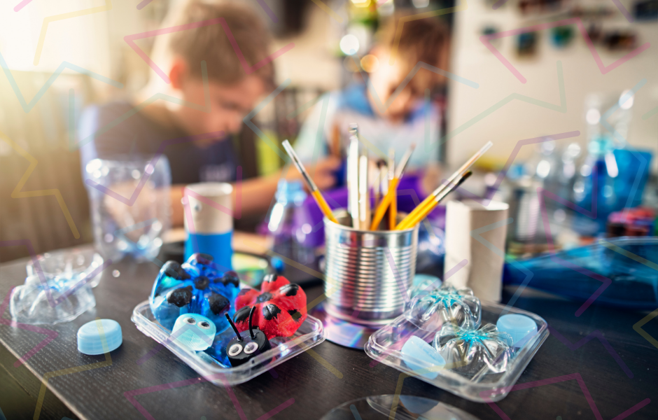 National Upcycling Day: A fun guide for kids - Children's English article Kids at a table upcycling bottles - National Upcycling Day: A fun guide for kids