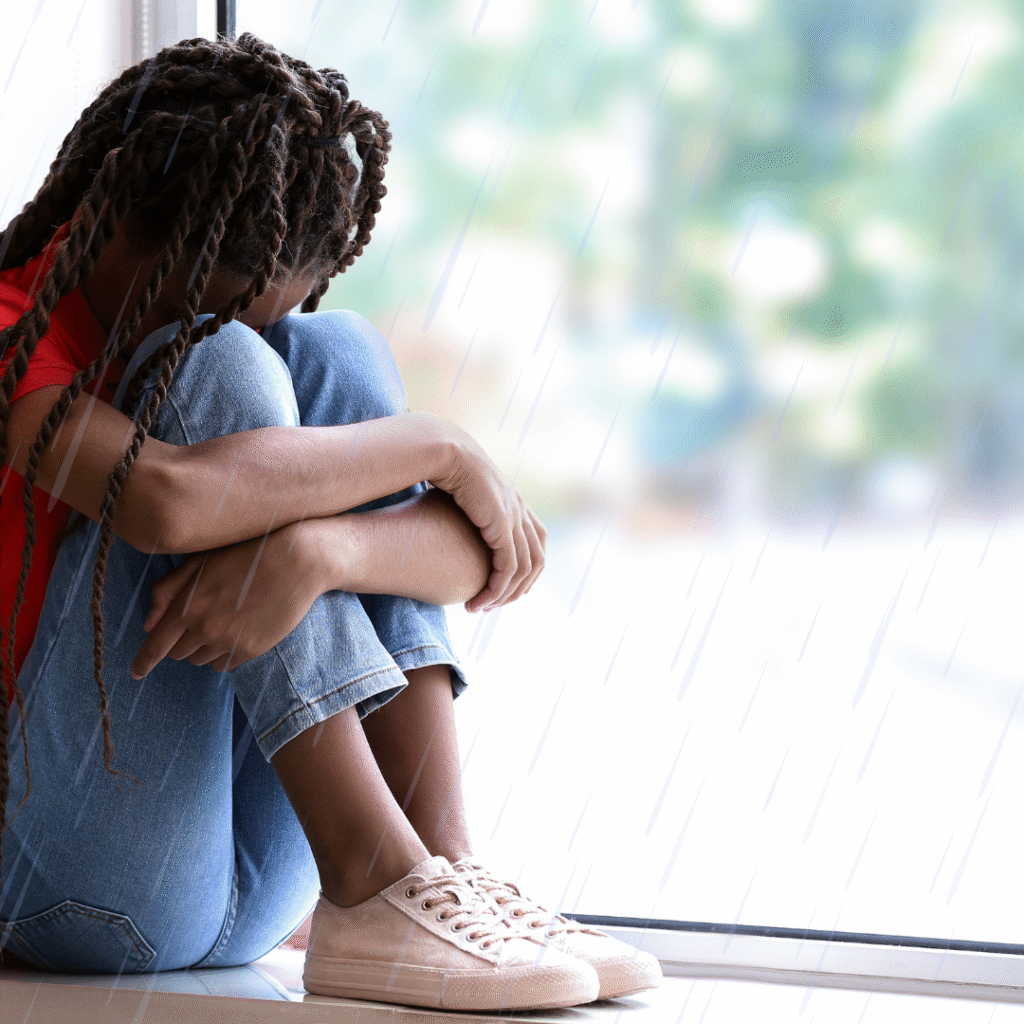 English news article for kids - Loneliness Girl sitting alone English news article for kids - Loneliness