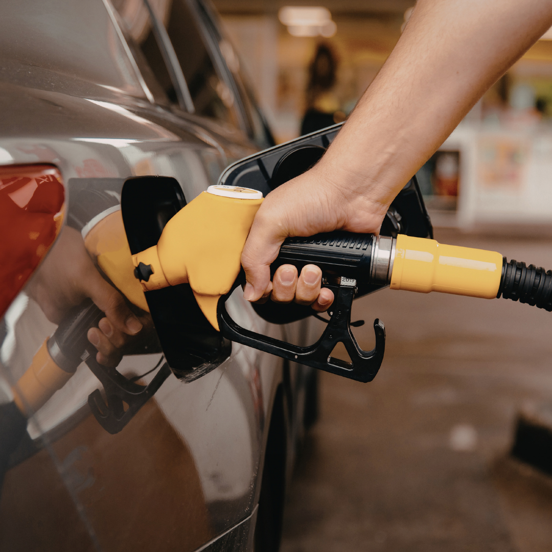 Filling up a car in a fuel station - Which type of car is better for the planet?